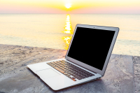 laptop-with-sun-background